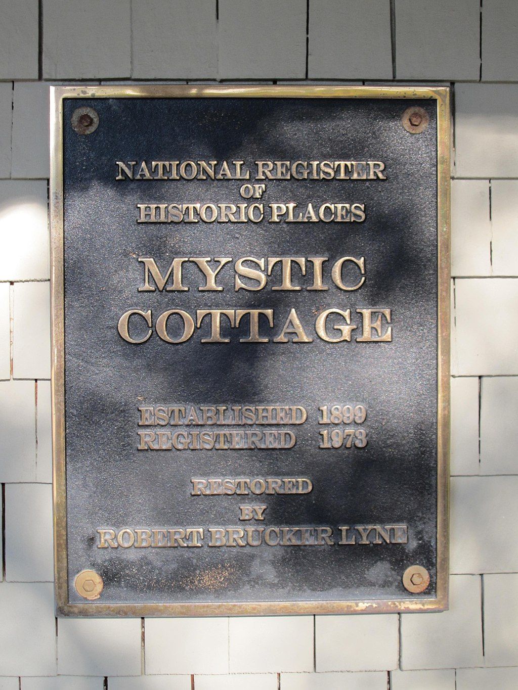 Sign of Mystic Cottage