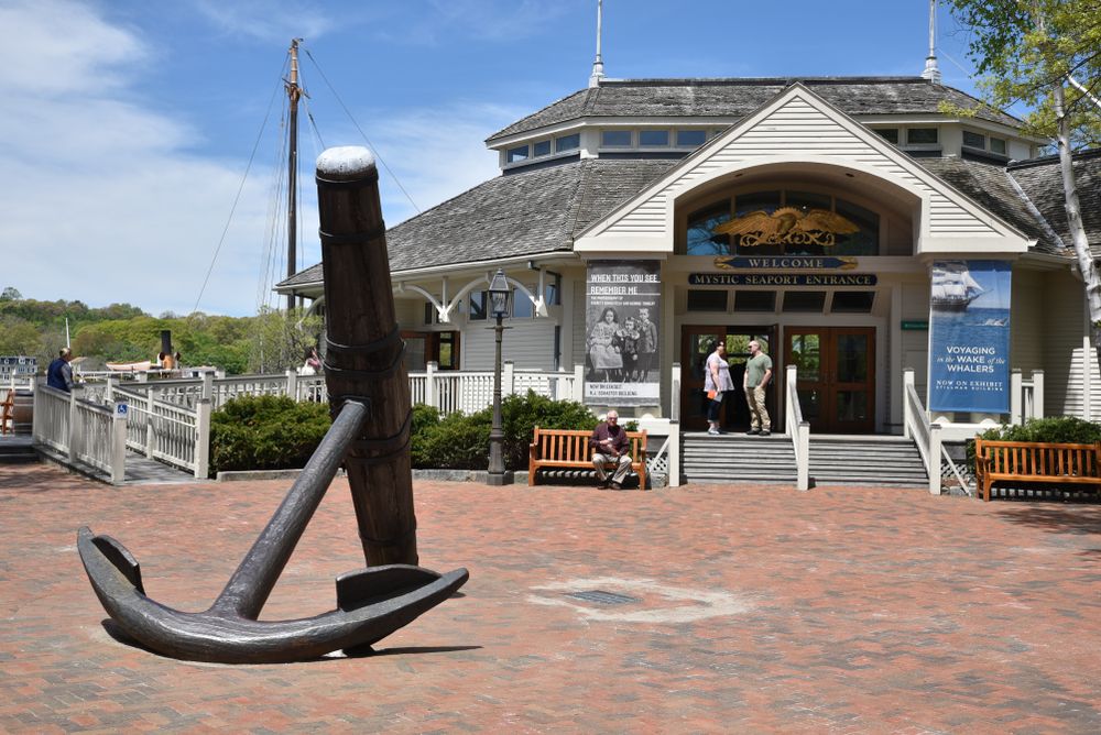 An anchor display in front of Mystic Seaport Museum.