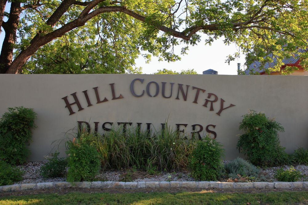 Name sign of Hill Country Distillers.