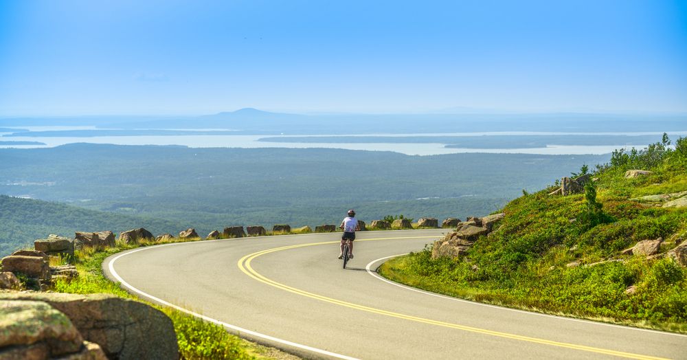 A person riding a bike at Acadia National Park
