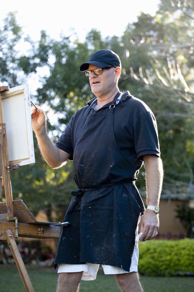 A painter painting at Albin Polasek Museum and Sculpture Garden