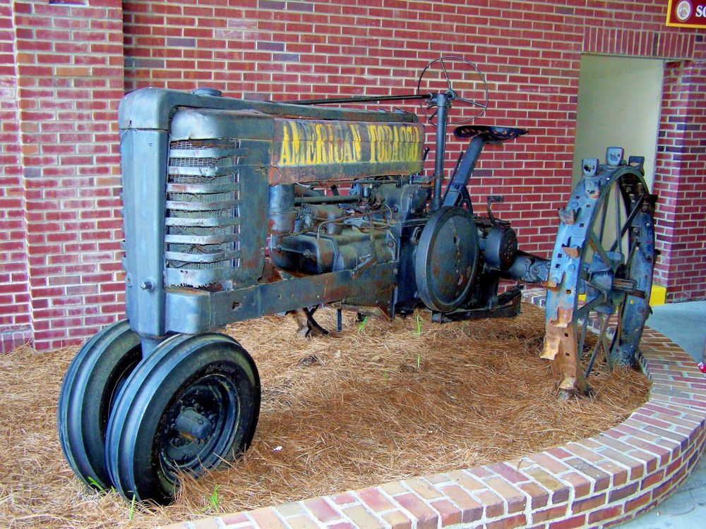 Display of a tractor at American Tobacco Campus Historic District