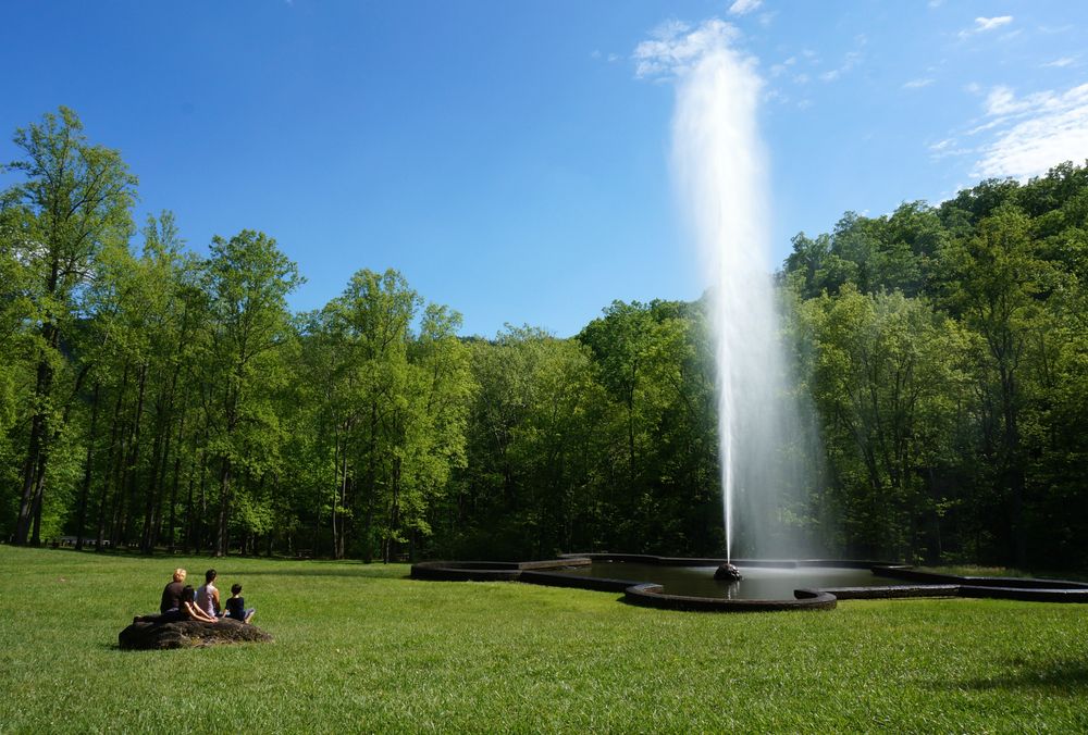 People watching waters of the Andrews Geyser