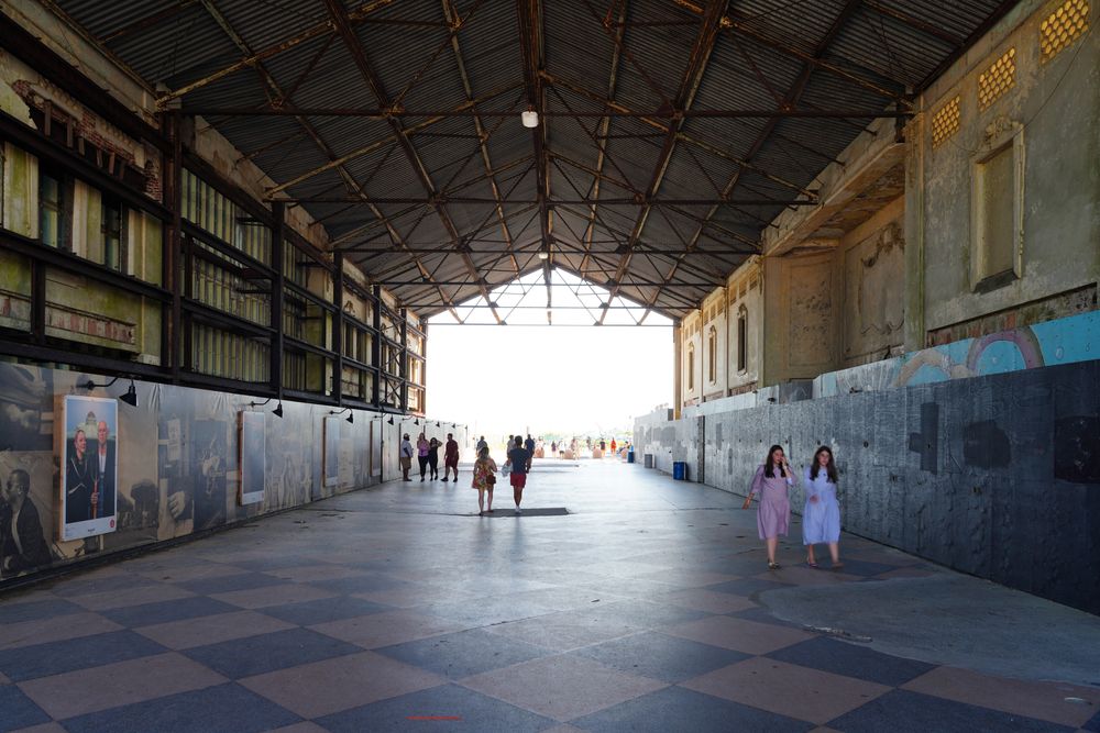 People walking inside the Asbury Park Casino