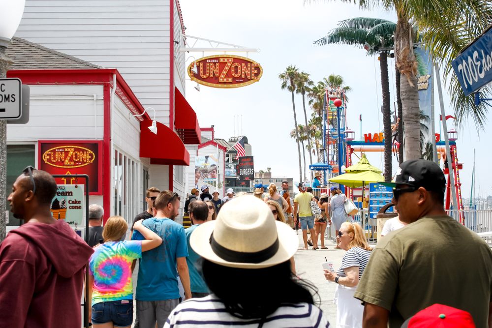 People enjoying the wide variety of entertainment at Balboa Fun Zone