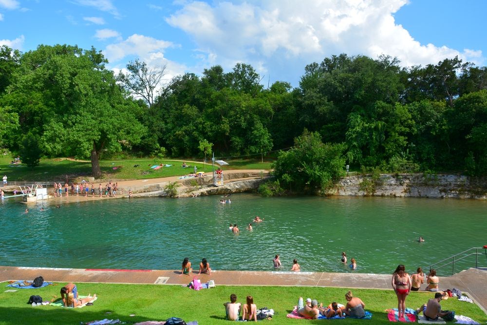 People enjoying their day at Barton Springs Pool