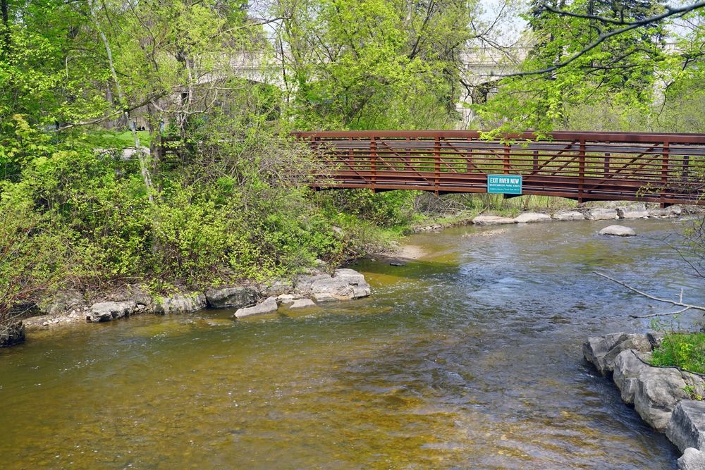 River flowing under a pedestrian bridge at Bear River Valley Recreation Area