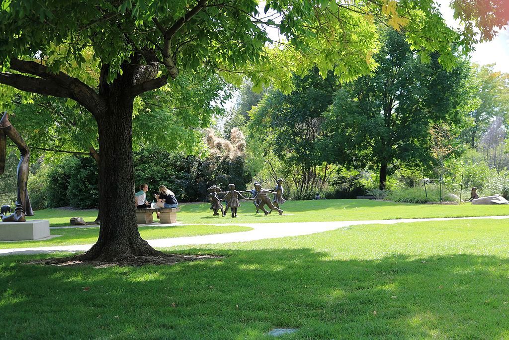 Statue of kids playing at Benson Park Sculpture Garden
