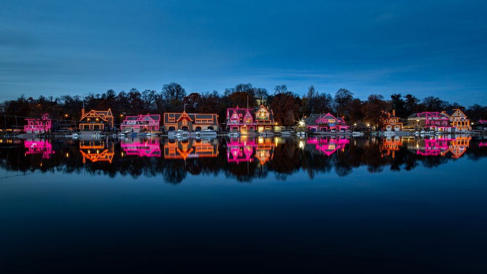 Boathouse Row decorated with colorful lights