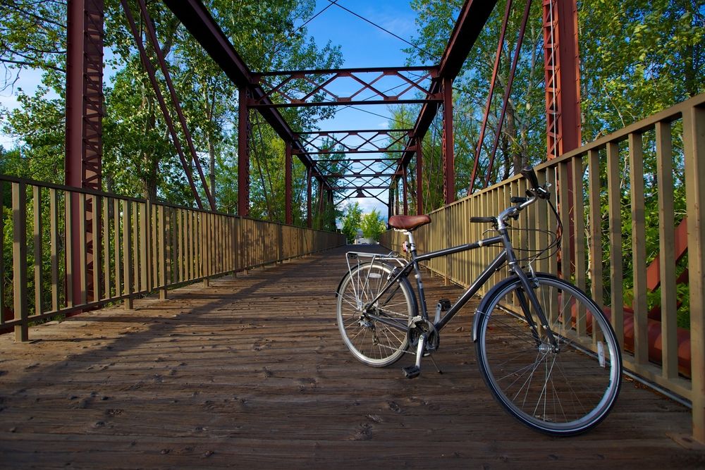 A bike parked on Boise River Greenbelt's bridge