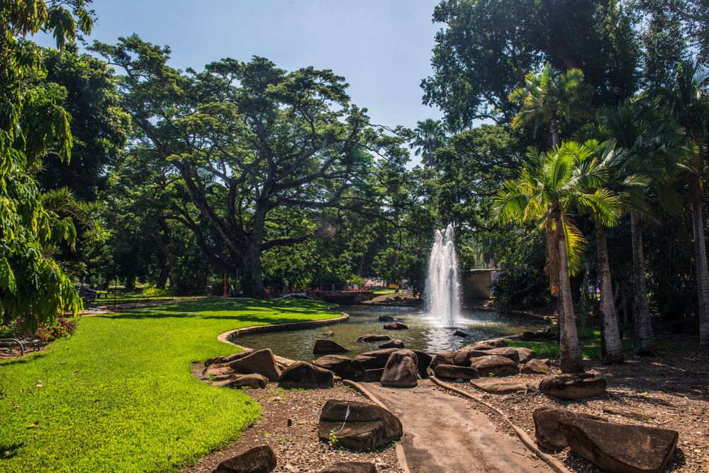 Artificial fountain and a pond at Botanical Garden in Darwin