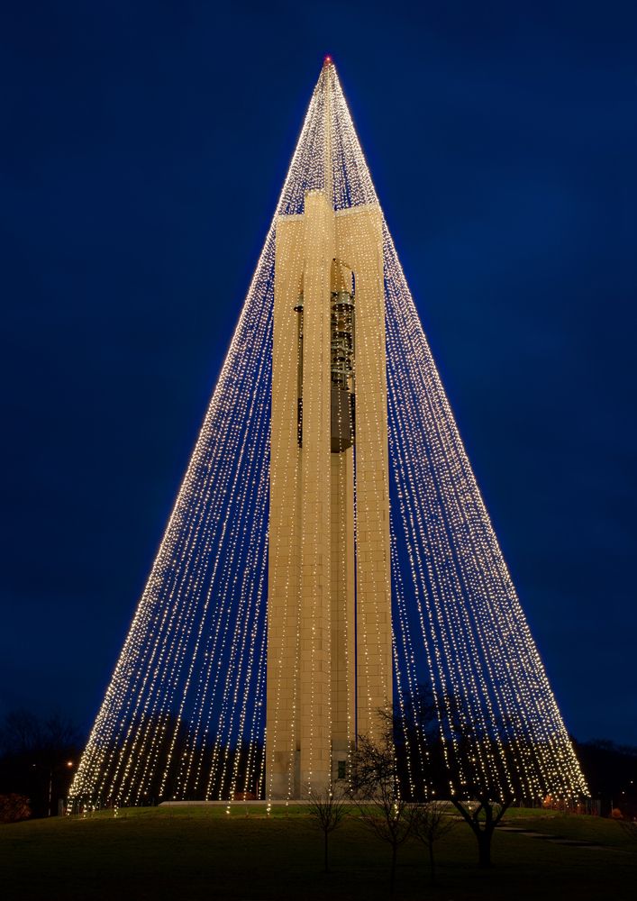 Tower at Carillon Historical Park decorated with lights during christmas