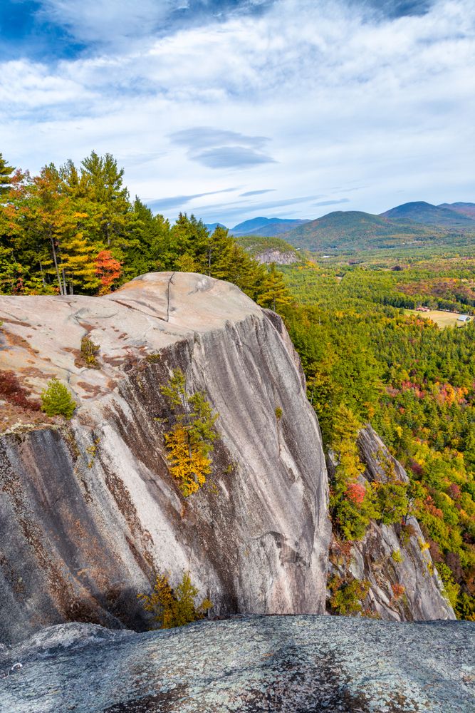 Cathedral Ledge surrounded by fall coloured leaves and tress