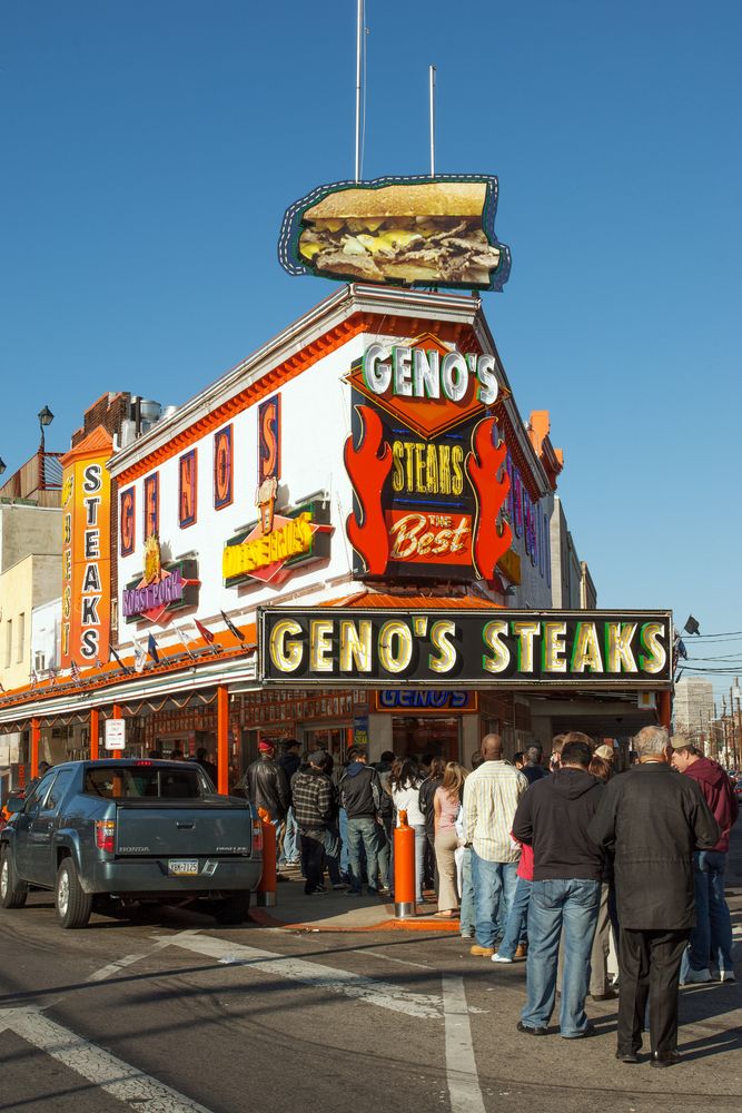 People waiting in a line to get Cheesesteaks at Philadelphia