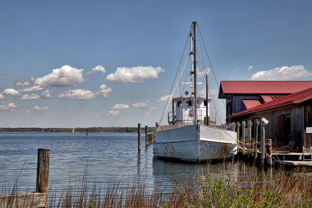 A boat docked at Chesapeake Bay Maritime Museum