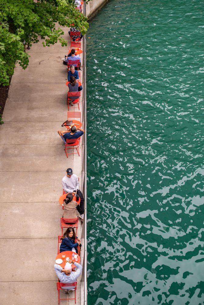 Visitors dining at a restaurant in the Chicago Riverwalk