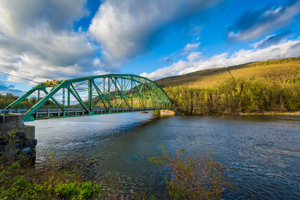 Scenic view of Connecticut River and a bridge over it