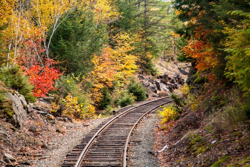 Beautiful view of railway track at Conway Scenic Railroad during Fall