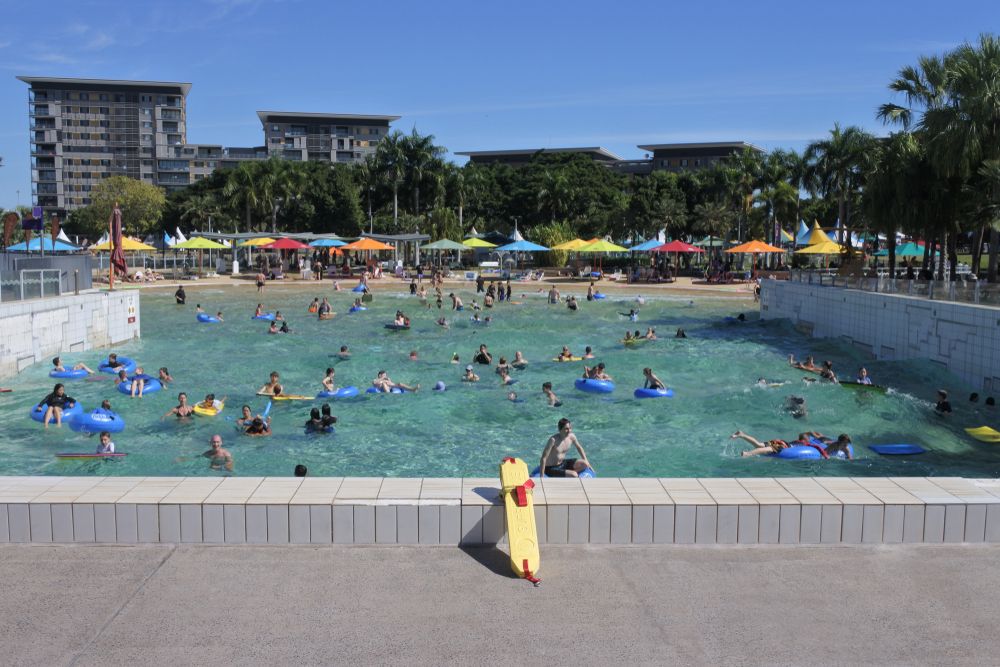 Many people swimming and enjoying in an inflatable floating tube at Darwin Waterfront Precinct