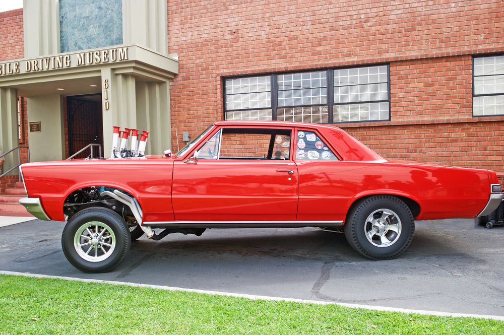 A vehicle in front of Zimmerman Automobile Driving Museum