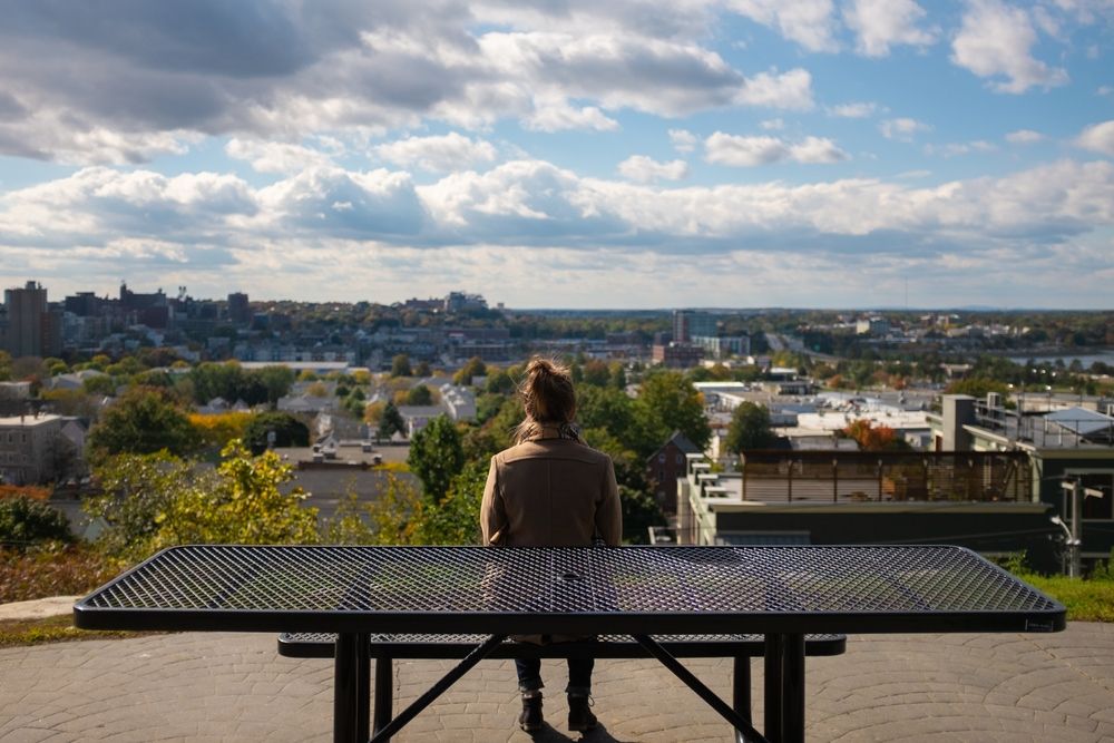 A young woman enjoying the view of Fort Sumner Park