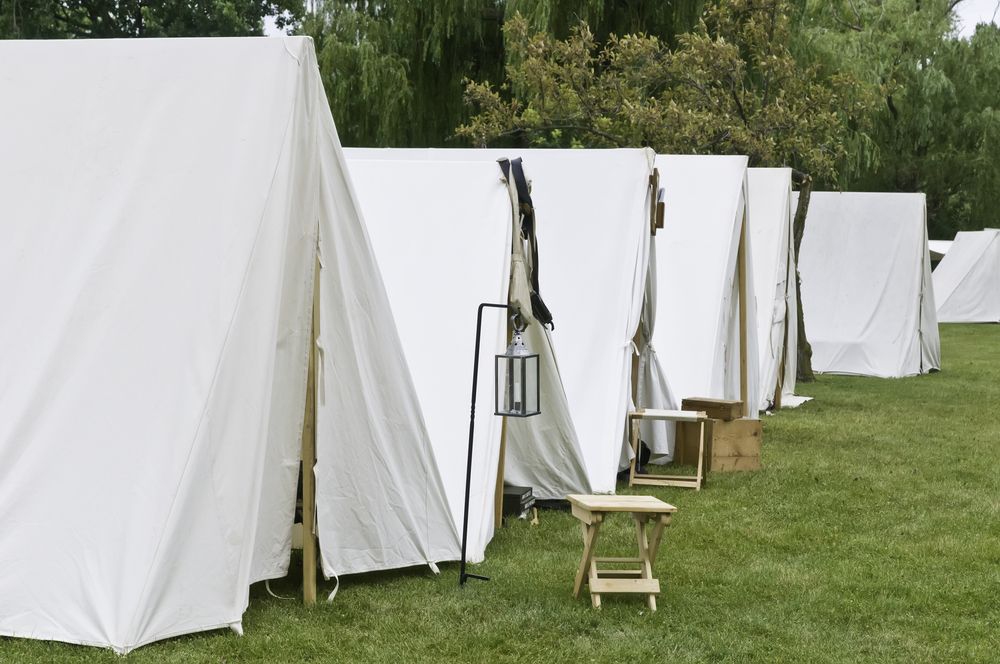 White tents at Four Seasons Park, Lombard.
