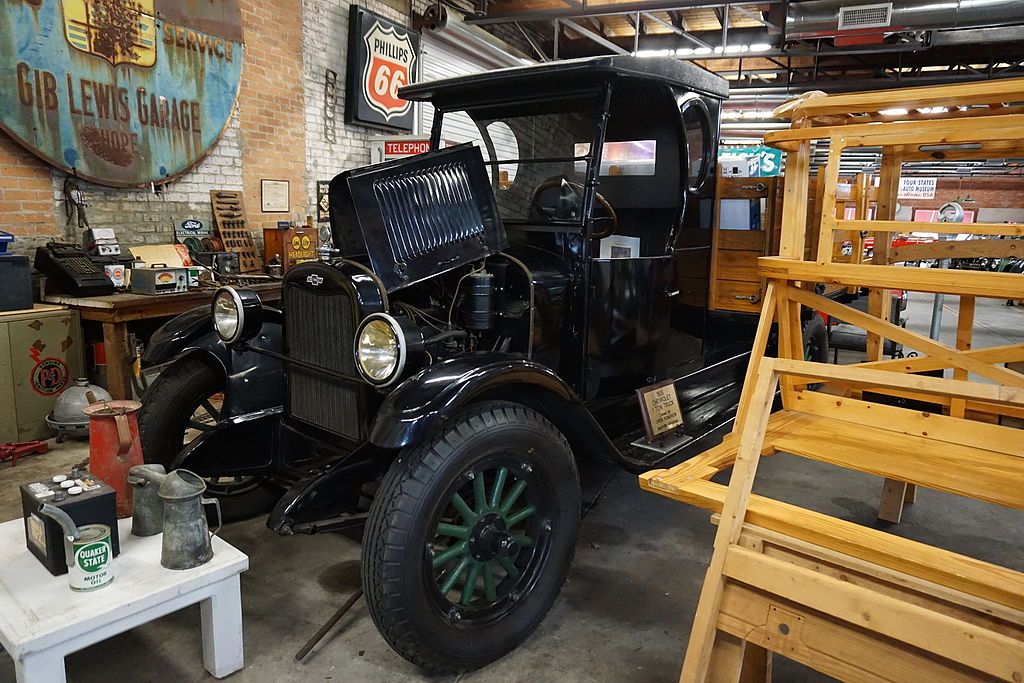 An old black truck at Four States Auto Museum