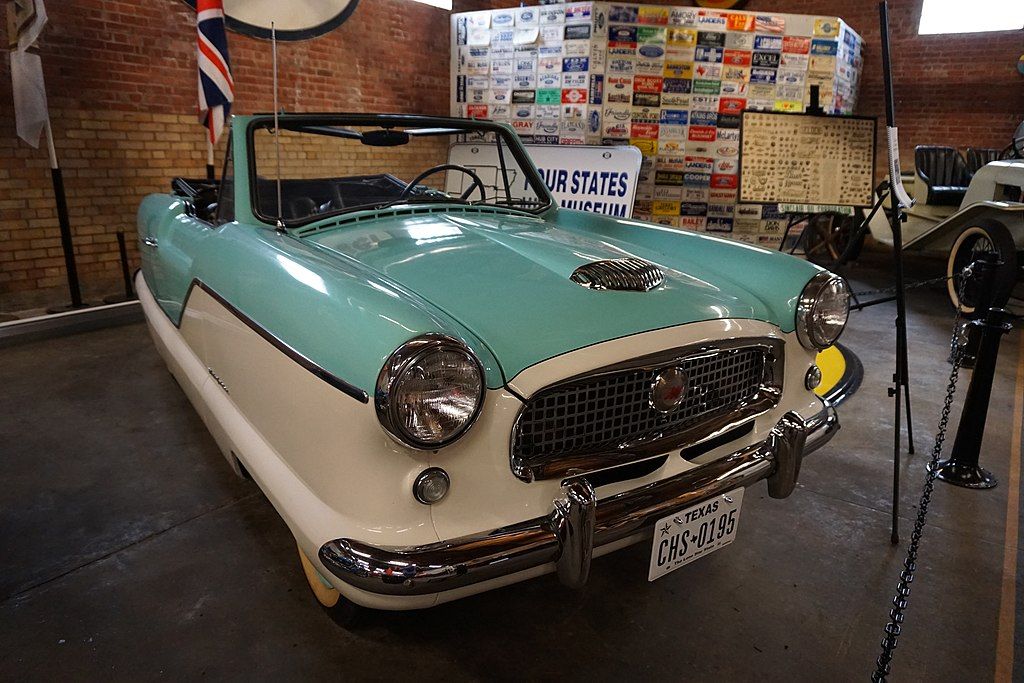 Display of a stylish vintage car at Four States Auto Museum