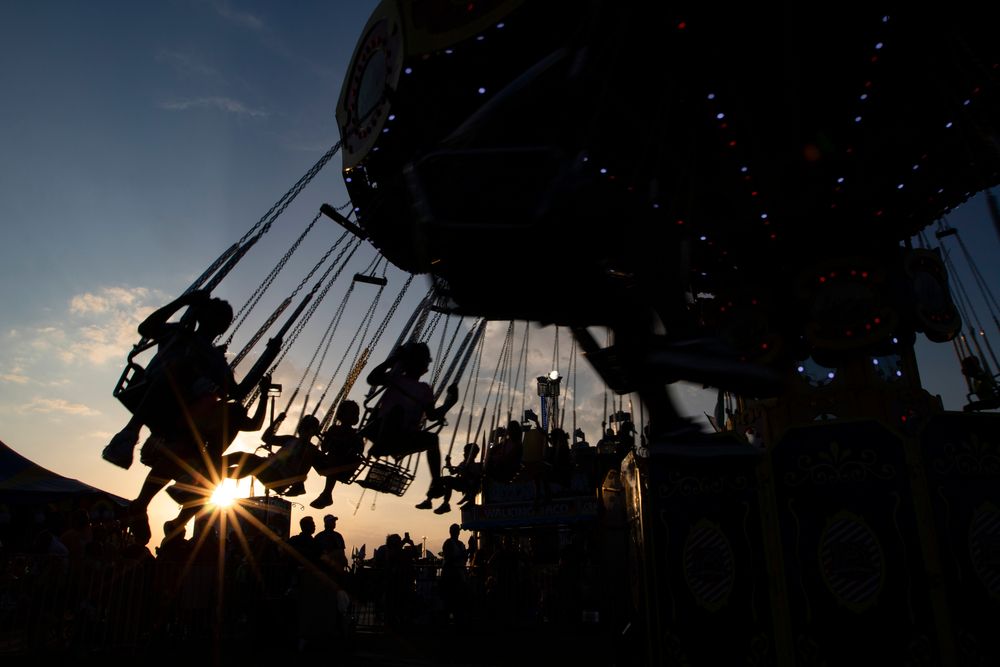 people on swing ride at Georgia National Fair