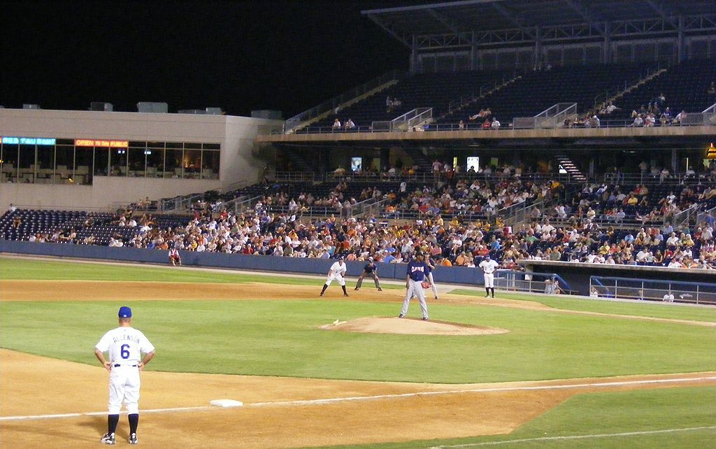 People enjoyin a baseball game at Harbor Park Stadium