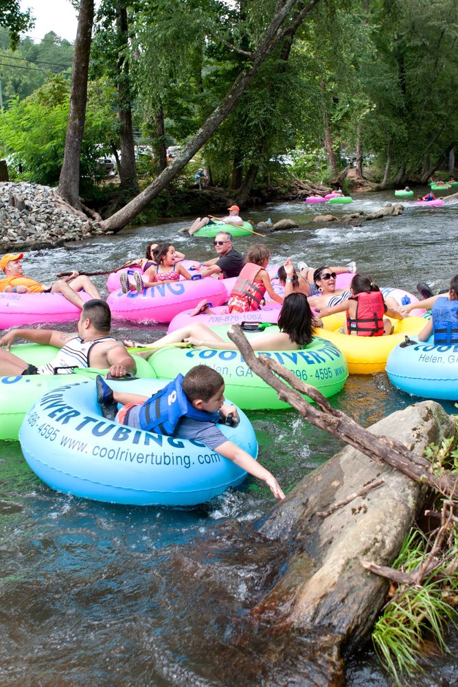Family enjoying tubing at Chattahoochee River in Helen, GA