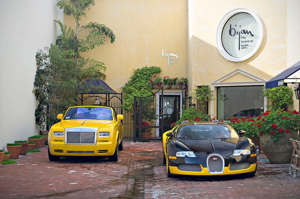 Fancy cars parked outside the House of Bijan