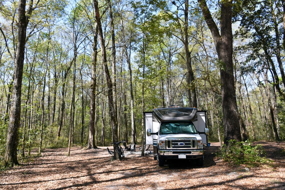 A RV parked on the campsite of Ichetucknee Springs State Park