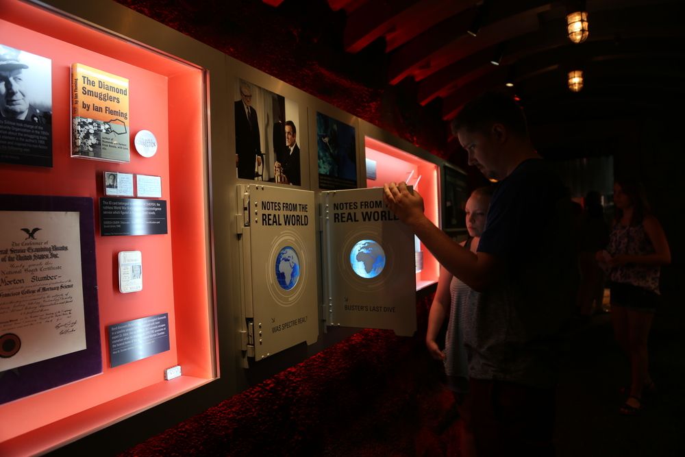 Visitors looking at the exhibits at International Spy Museum