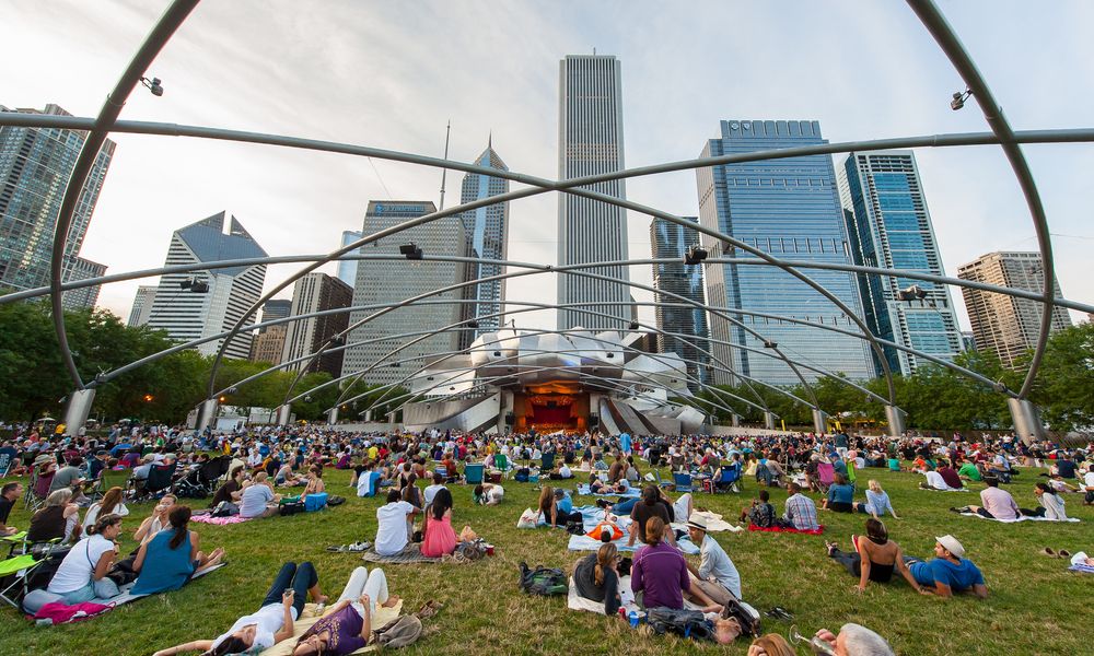 Visitors enjoying an event at Jay Pritzker Pavilion