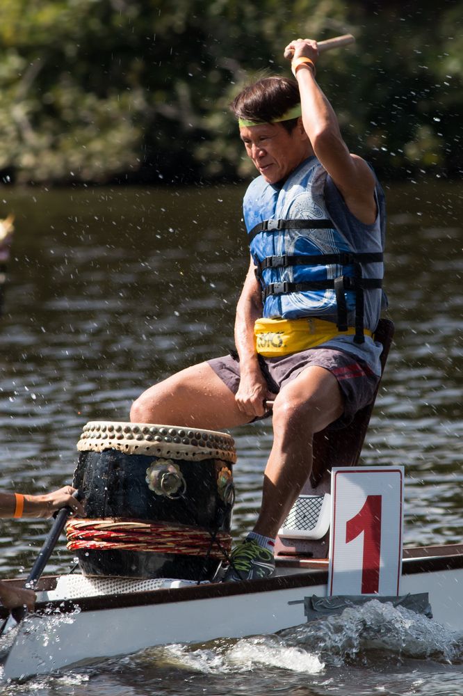 A man in a dragon boat at Koka Booth Amphitheatre