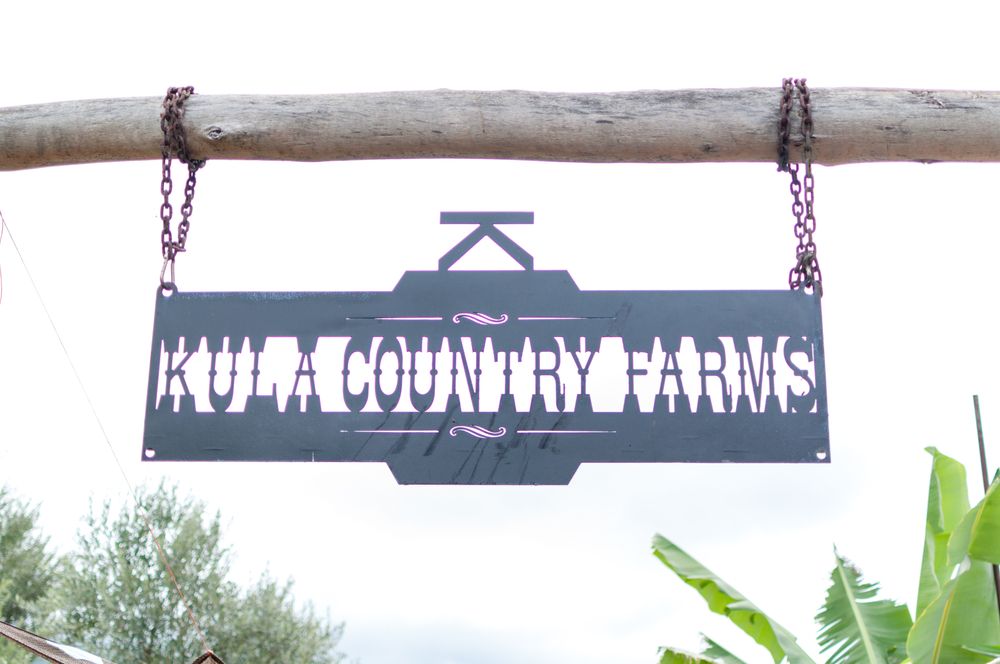 Name sign of Kula Country Farms