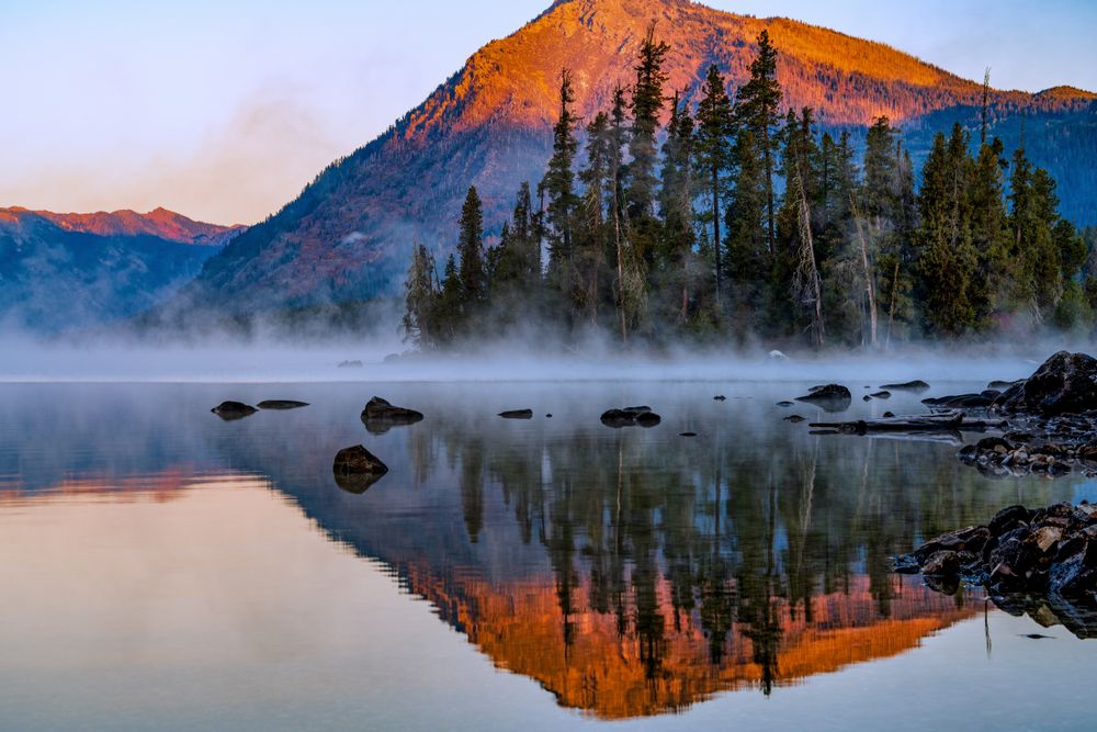 Sunrise during a foggy morning at Lake Wenatchee