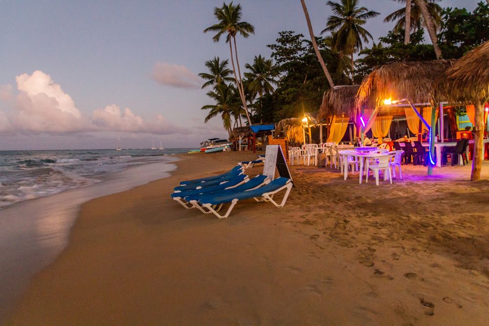 Local cafés lit up during the evening at Las Terrenas