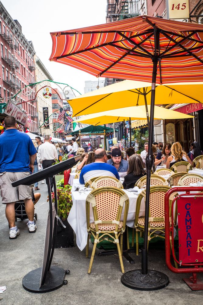 People enjoying their food at Little Italy
