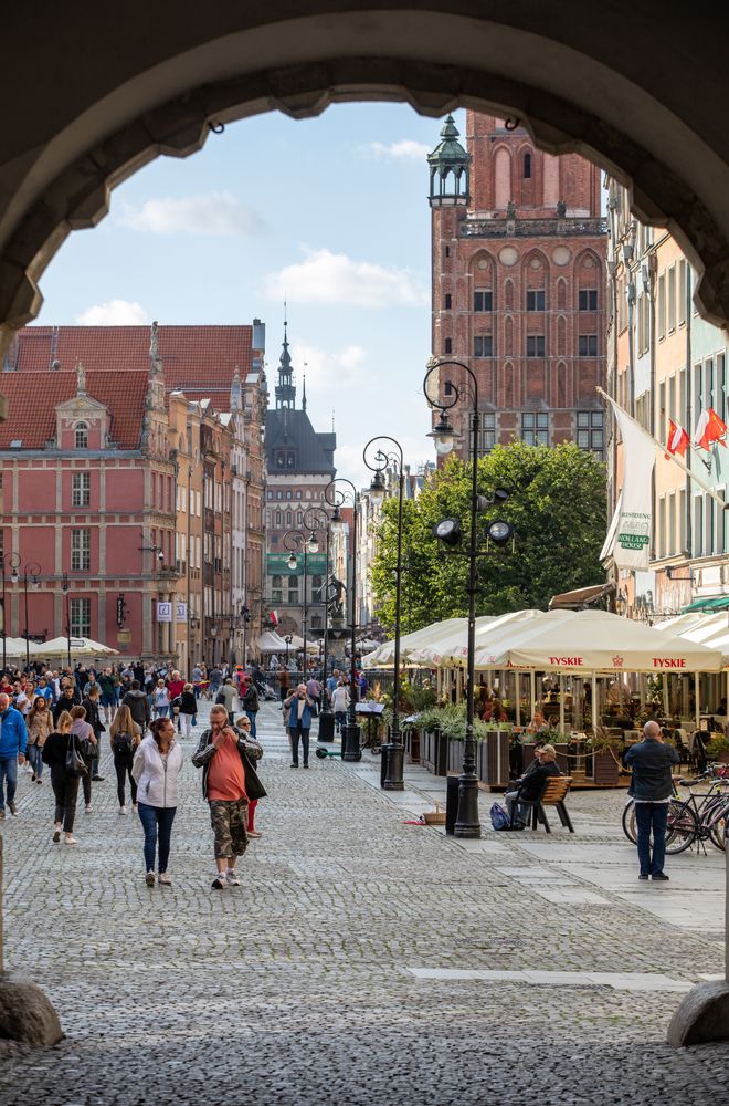 People walking around the Long Market