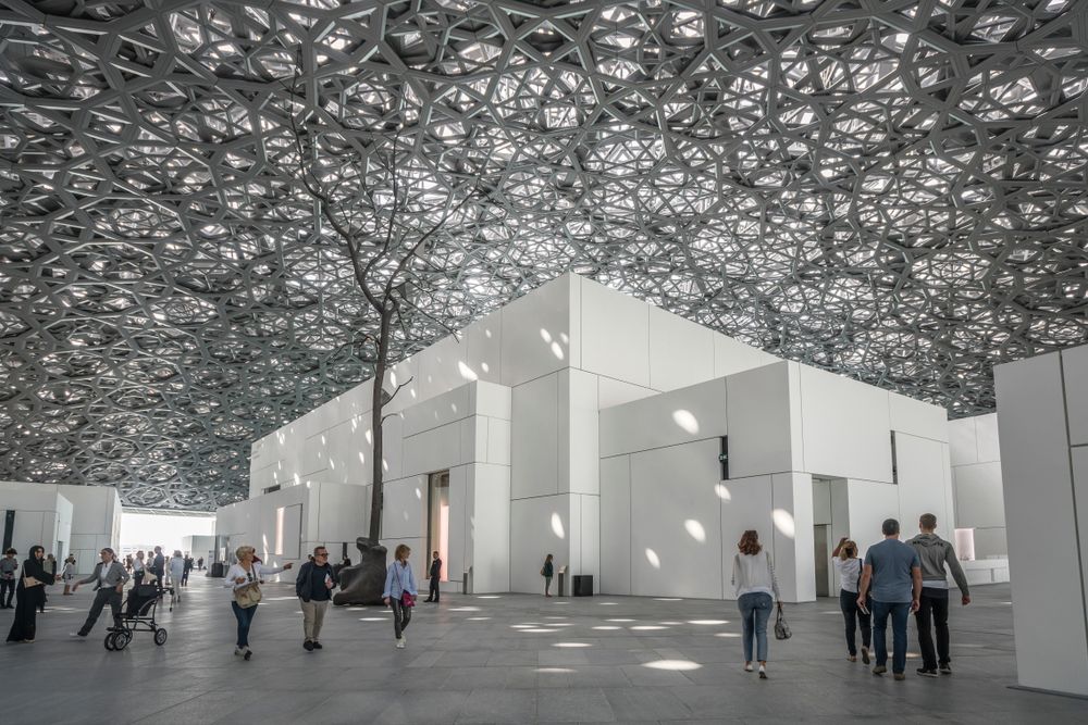 People strolling around the Louvre Abu Dhabi