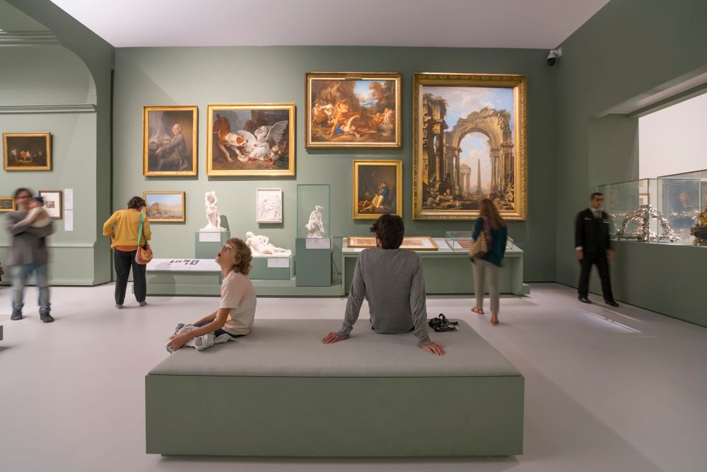 People looking at the displays at Louvre Abu Dhabi
