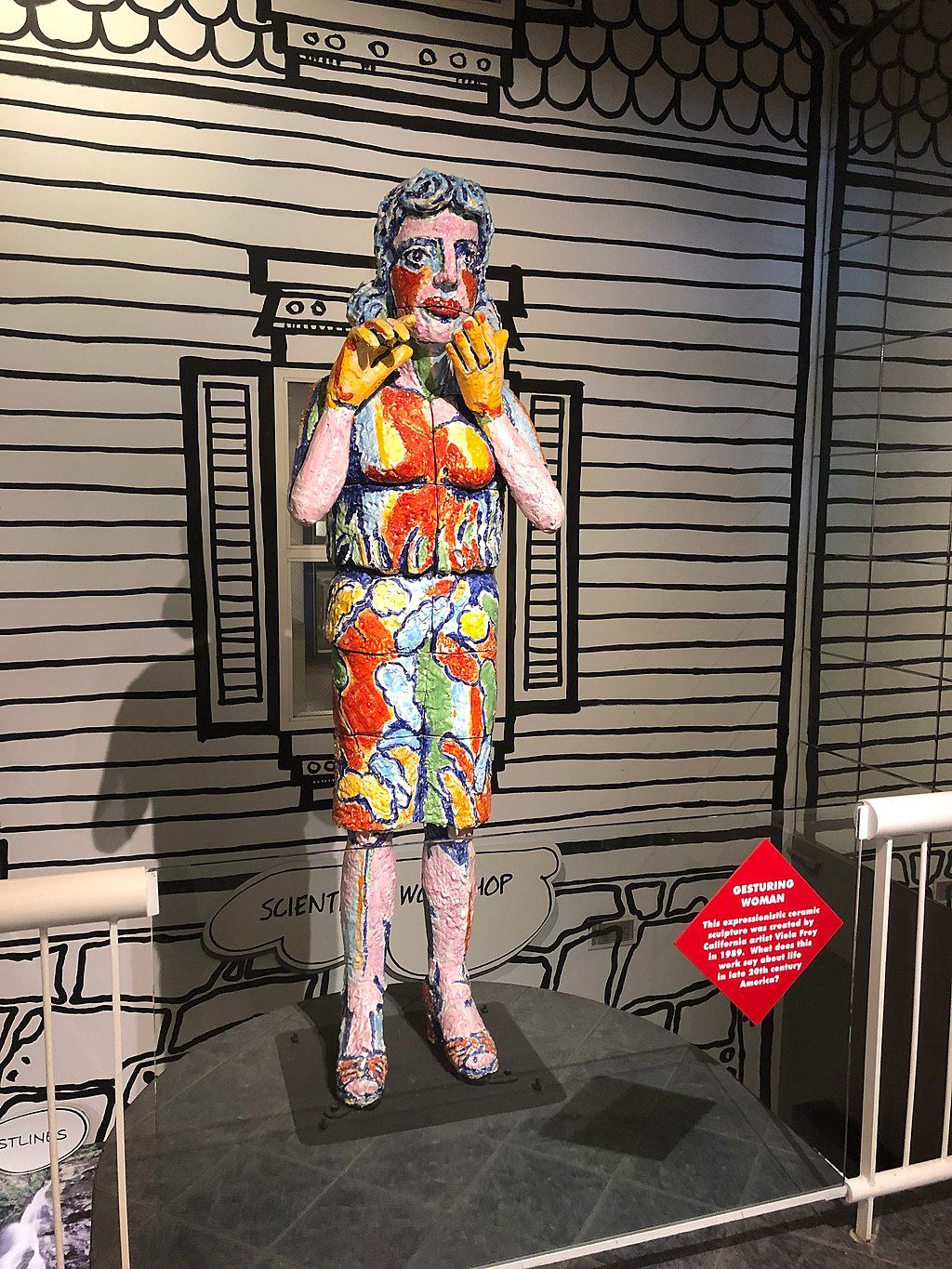 Gesturing woman art in Museum of Arts and Sciences