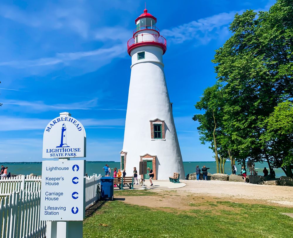 Exterior and name sign of Marblehead Lighthouse.