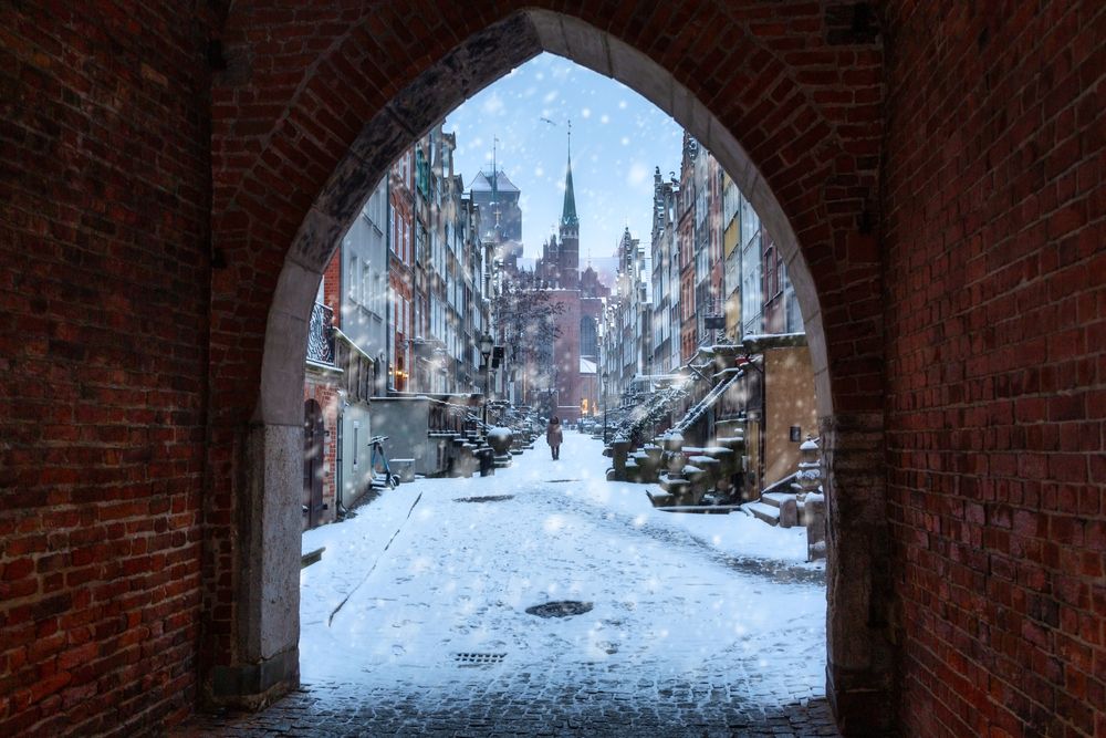View of the Mariacka Street on a snowy day