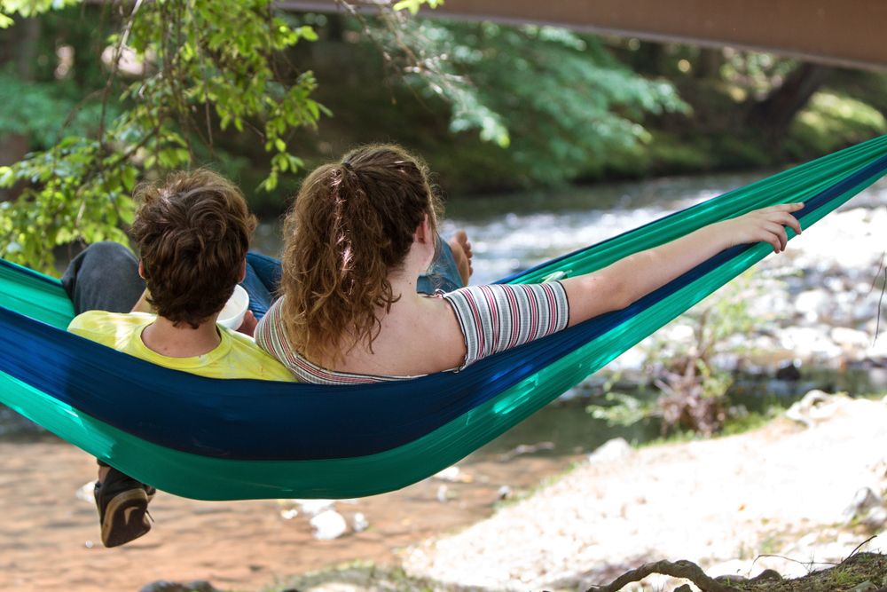 A couple relaxing in Meeks Park