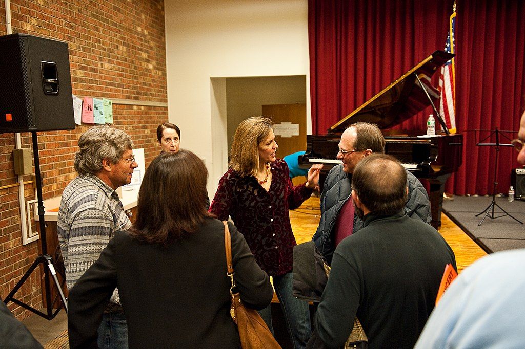 Visitors discussing at Monmouth County Library
