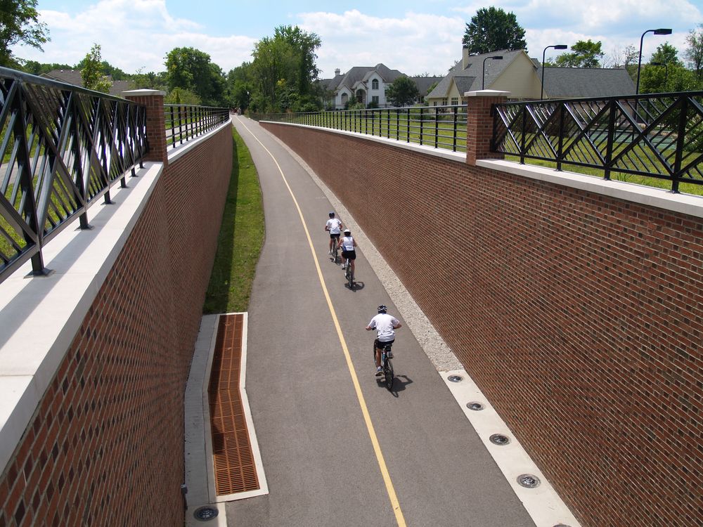 Men biking along the Monon Trail.