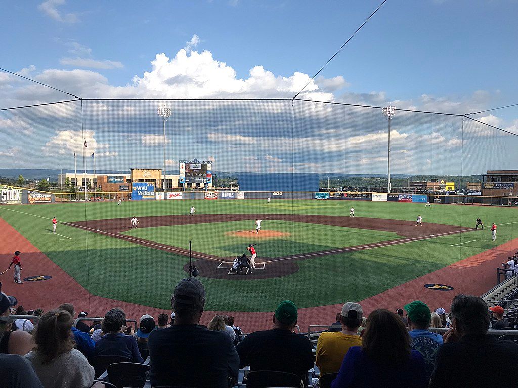 People enjoying a baseball game at Monongalia County Ballpark